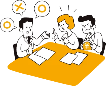 家づくりのコストを相談するお客さんとスタッフ